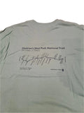 Green t-shirt with Hadrian's Wall Path National Trail design.
